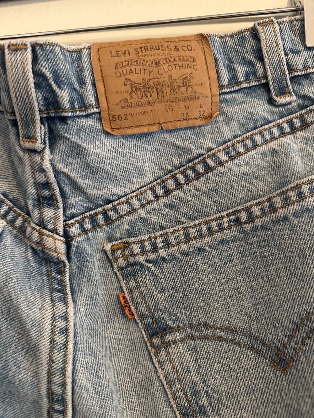 Vintage Levi's 562 Blue Jeans W28 L32 Patchwork Denim - Orange Tab